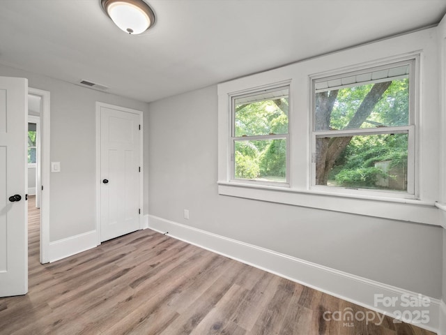 144 Walnut St, Chester, SC 29706 - spare room with baseboards and light wood finished floors