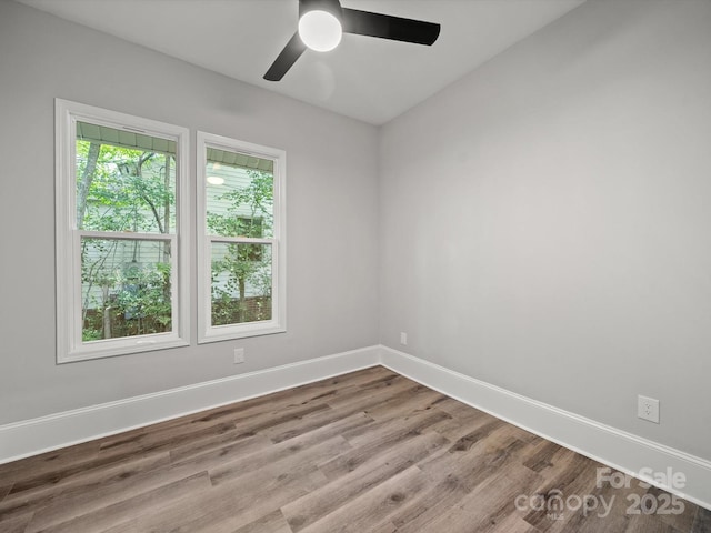 144 Walnut St, Chester, SC 29706 - spare room featuring a ceiling fan and wood finished floors