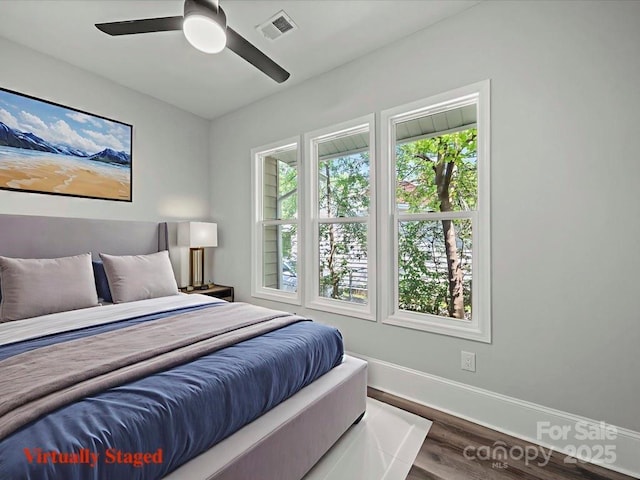 144 Walnut St, Chester, SC 29706 - bedroom featuring wood finished floors and ceiling fan