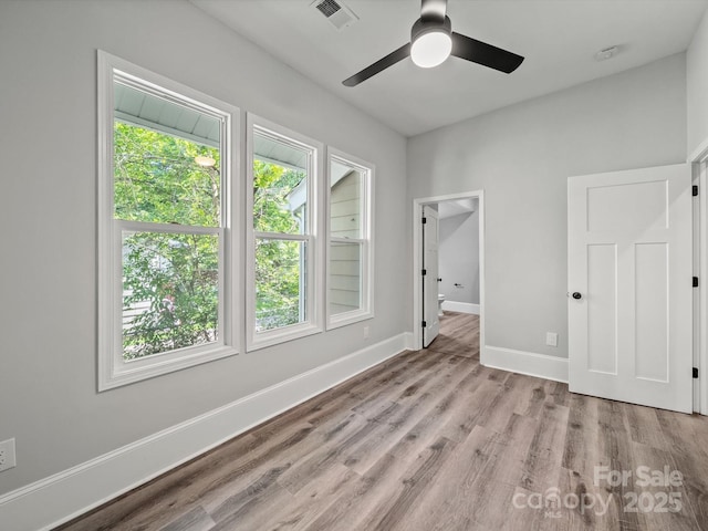 144 Walnut St, Chester, SC 29706 - unfurnished bedroom with wood finished floors and a ceiling fan
