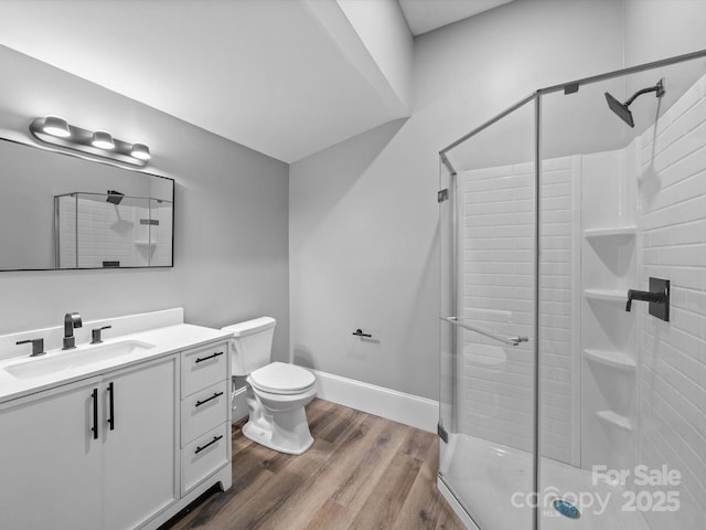 144 Walnut St, Chester, SC 29706 - full bathroom with vanity, a stall shower, and wood finished floors