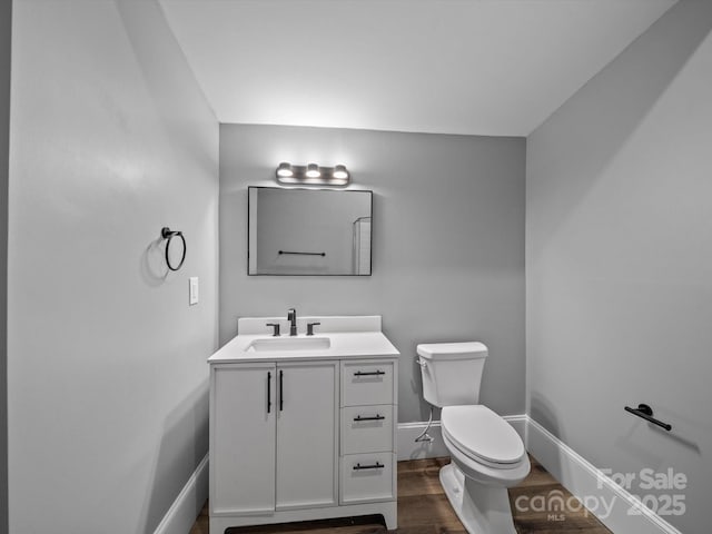 144 Walnut St, Chester, SC 29706 - half bathroom with wood finished floors and vanity
