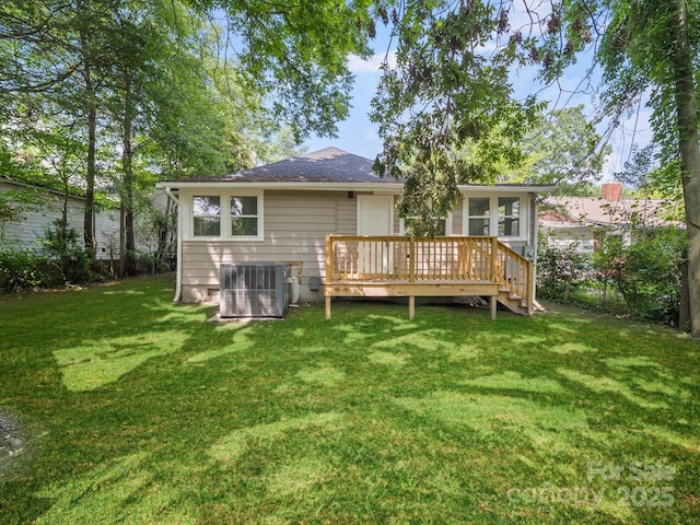 144 Walnut St, Chester, SC 29706 - back of house with a wooden deck, a lawn, and a shingled roof
