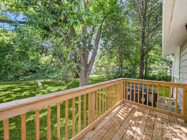 144 Walnut St, Chester, SC 29706 - wooden deck featuring a lawn