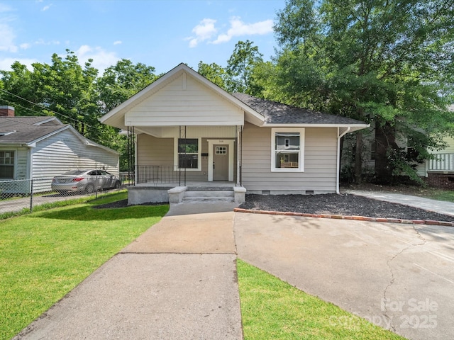 144 Walnut St, Chester, SC 29706 - bungalow featuring a porch, crawl space, and a shingled roof