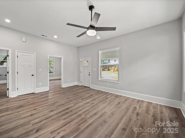 144 Walnut St, Chester, SC 29706 - unfurnished living room featuring recessed lighting, wood finished floors, and a ceiling fan