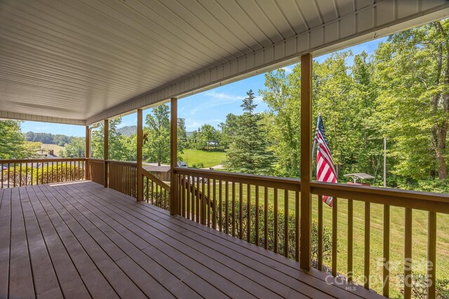 449 Concord Rd, Fletcher, NC 28732 - wooden deck featuring a lawn and view of scattered trees
