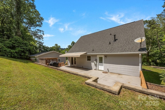 449 Concord Rd, Fletcher, NC 28732 - rear view of house with a patio area, a lawn, and roof with shingles