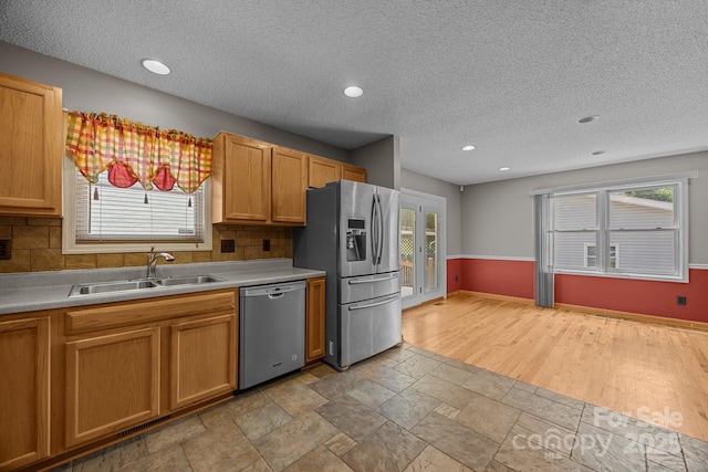 449 Concord Rd, Fletcher, NC 28732 - kitchen with appliances with stainless steel finishes, healthy amount of natural light, a sink, a textured ceiling, and recessed lighting