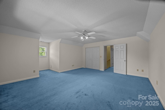 449 Concord Rd, Fletcher, NC 28732 - additional living space with a ceiling fan, carpet floors, baseboards, and a textured ceiling