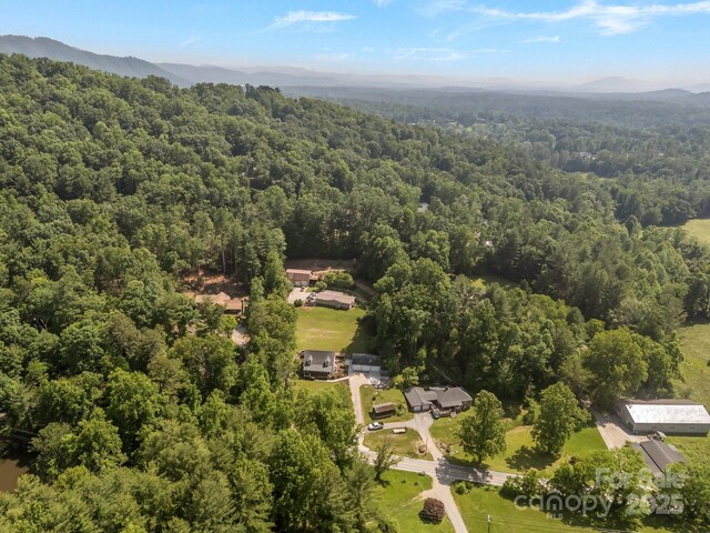 449 Concord Rd, Fletcher, NC 28732 - aerial view of property and surrounding area featuring a forest and a mountainous background