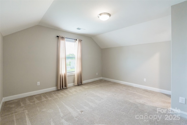 174 Pine Eagle Dr, Rock Hill, SC 29732 - additional living space with vaulted ceiling, carpet floors, and baseboards