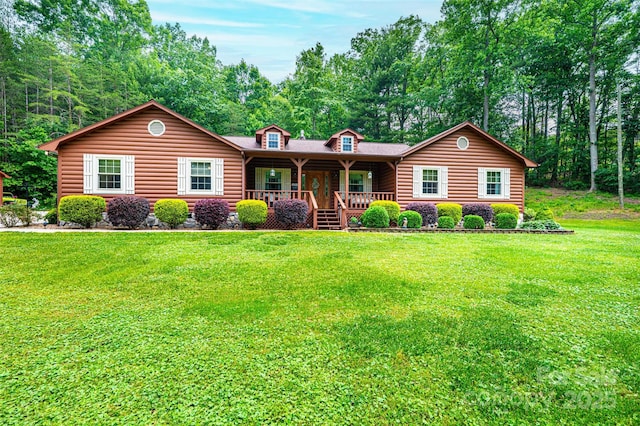 377 Birch Circle Dr, Hudson, NC 28638 - view of front facade featuring covered porch and a front yard