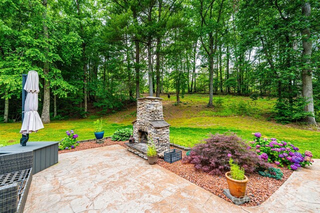 377 Birch Circle Dr, Hudson, NC 28638 - view of patio featuring an outdoor stone fireplace