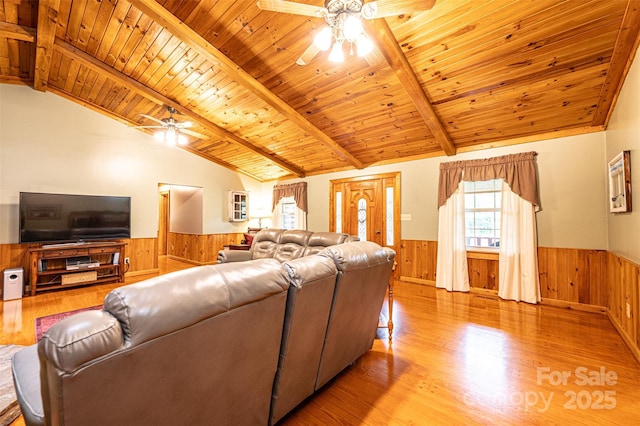 377 Birch Circle Dr, Hudson, NC 28638 - living room with a ceiling fan, a wainscoted wall, wooden walls, and wood finished floors
