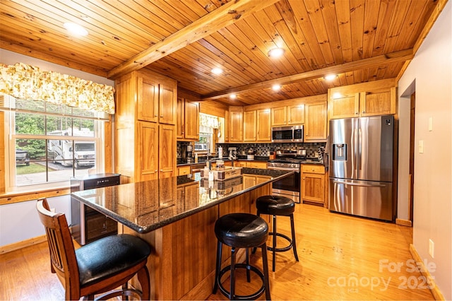 377 Birch Circle Dr, Hudson, NC 28638 - kitchen with stainless steel appliances, light wood-type flooring, baseboards, tasteful backsplash, and wood ceiling with exposed beams
