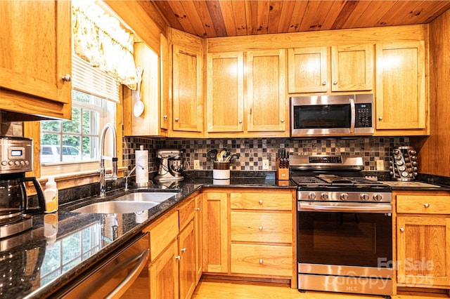377 Birch Circle Dr, Hudson, NC 28638 - kitchen with stainless steel appliances, a sink, wood ceiling, decorative backsplash, and light wood-style flooring