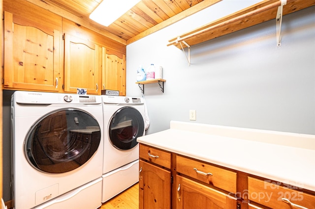 377 Birch Circle Dr, Hudson, NC 28638 - laundry area with cabinet space, washer and dryer, light wood-style flooring, and wooden ceiling