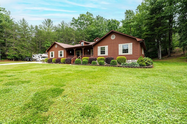 377 Birch Circle Dr, Hudson, NC 28638 - view of front of house with covered porch and a front lawn