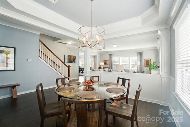 2246 Bluebell Way, Tega Cay, SC 29708 - dining area with dark wood-style floors, a chandelier, and stairs