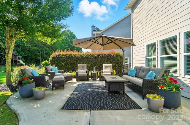 2246 Bluebell Way, Tega Cay, SC 29708 - view of patio featuring outdoor lounge area and a playground