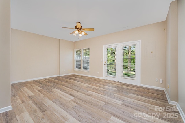 5322 Jocelyn Ln, Charlotte, NC 28269 - empty room featuring ceiling fan, light wood finished floors, and baseboards