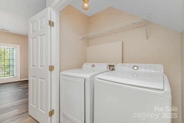 5322 Jocelyn Ln, Charlotte, NC 28269 - washroom featuring washer and dryer and light wood-style flooring