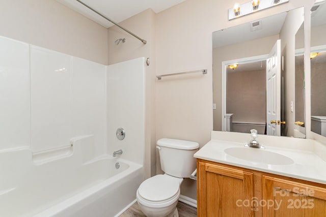 5322 Jocelyn Ln, Charlotte, NC 28269 - bathroom with toilet,  shower combination, and vanity