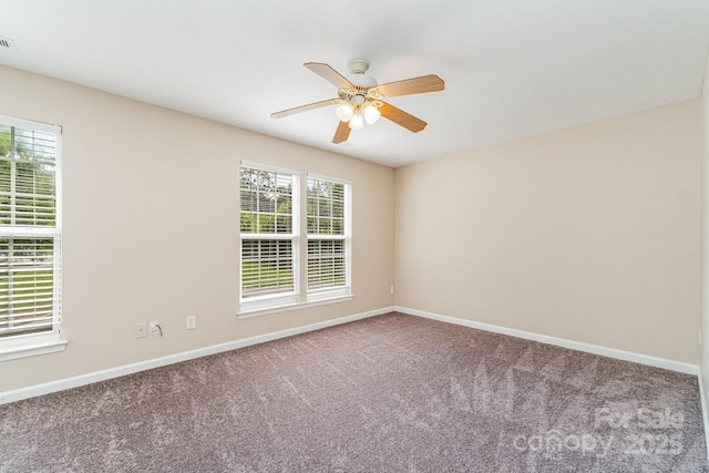 5322 Jocelyn Ln, Charlotte, NC 28269 - carpeted empty room featuring baseboards and a ceiling fan