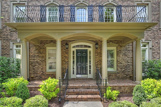 7319 Stonehaven Dr, Waxhaw, NC 28173 - entrance to property featuring a balcony and brick siding