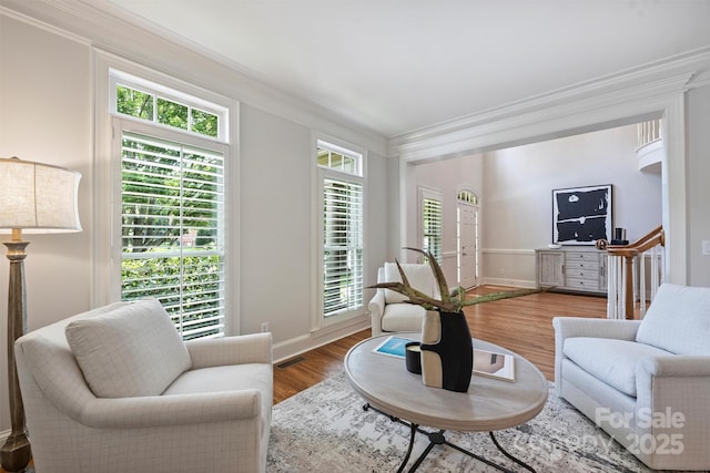 7319 Stonehaven Dr, Waxhaw, NC 28173 - living room featuring crown molding, baseboards, and wood finished floors