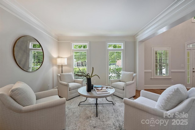 7319 Stonehaven Dr, Waxhaw, NC 28173 - living area featuring crown molding, wood finished floors, and baseboards