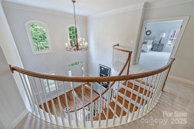 7319 Stonehaven Dr, Waxhaw, NC 28173 - stairs featuring a chandelier, baseboards, crown molding, and carpet floors