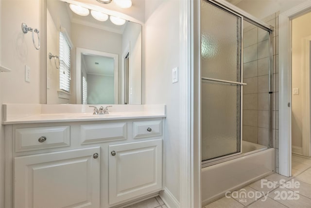 7319 Stonehaven Dr, Waxhaw, NC 28173 - full bath with tile patterned floors, vanity, combined bath / shower with glass door, and baseboards