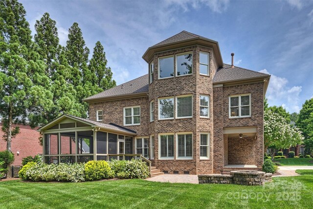 7319 Stonehaven Dr, Waxhaw, NC 28173 - rear view of house featuring a sunroom, brick siding, and a yard