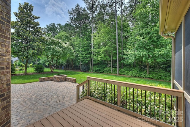 7319 Stonehaven Dr, Waxhaw, NC 28173 - wooden deck featuring an outdoor fire pit, a patio, and view of scattered trees