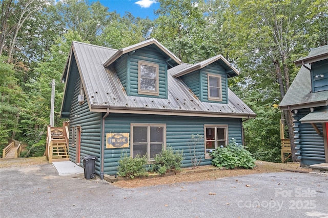 214 Mckenzie Way, Old Fort, NC 28762 - view of front of home featuring stairs, metal roof, and log veneer siding