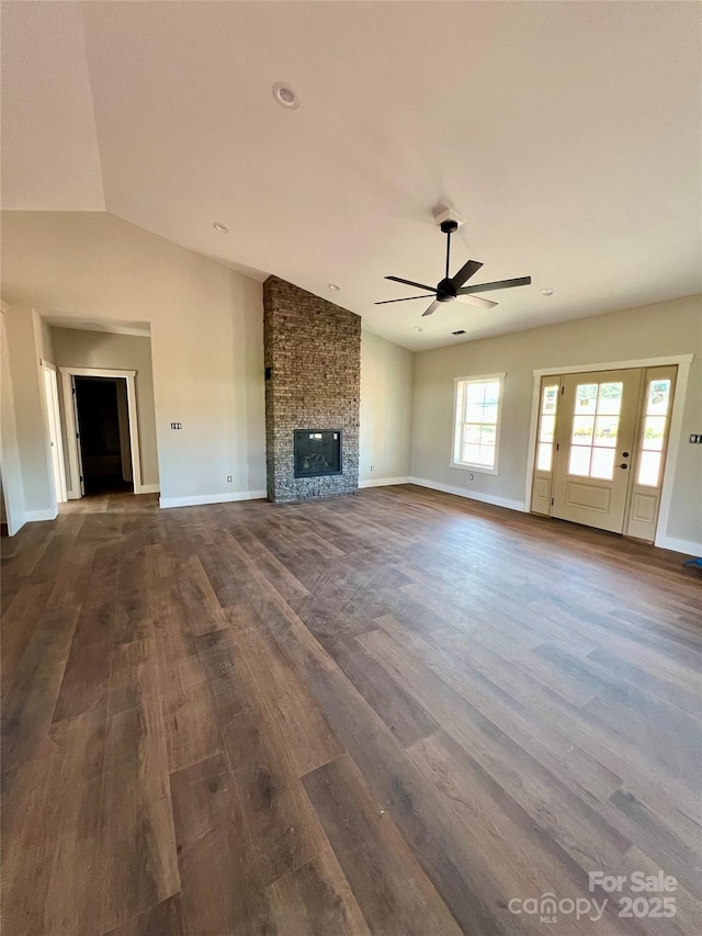 3000 Paul Payne Store Rd, Taylorsville, NC 28681 - unfurnished living room with lofted ceiling, dark wood finished floors, ceiling fan, and a fireplace