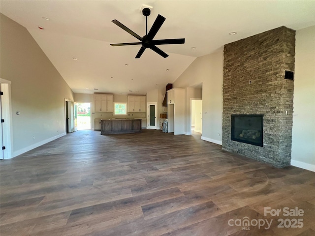 3000 Paul Payne Store Rd, Taylorsville, NC 28681 - unfurnished living room featuring high vaulted ceiling, ceiling fan, dark wood finished floors, and a fireplace