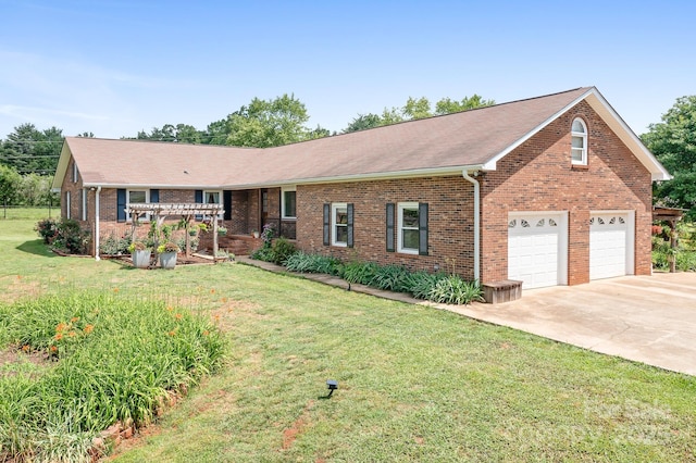 4026 Biggerstaff Rd, Maiden, NC 28650 - view of front of home featuring concrete driveway, brick siding, and a front yard