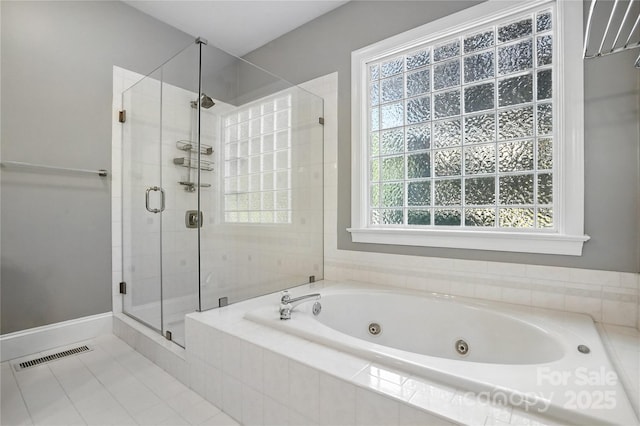 104 Fairwind Ct, Fort Mill, SC 29708 - bathroom featuring a whirlpool tub, a shower stall, and tile patterned flooring