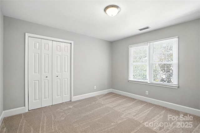 104 Fairwind Ct, Fort Mill, SC 29708 - unfurnished bedroom with light carpet and a closet