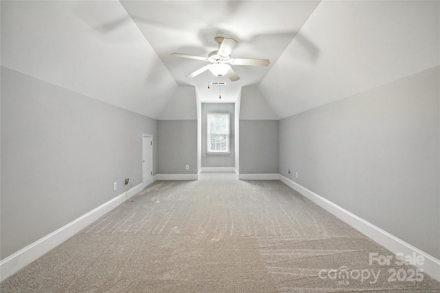 104 Fairwind Ct, Fort Mill, SC 29708 - additional living space featuring carpet floors, ceiling fan, and vaulted ceiling