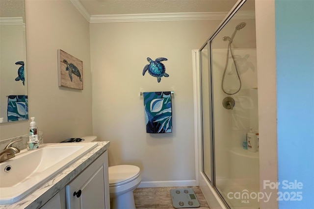 2449 Leonhardt Rd, Cherryville, NC 28021 - bathroom with ornamental molding, a shower stall, vanity, baseboards, and toilet