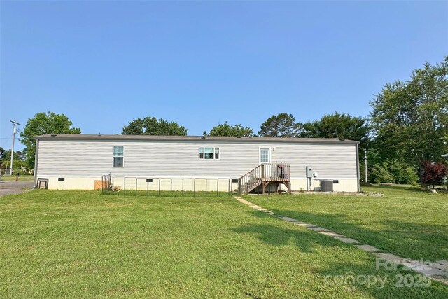 2449 Leonhardt Rd, Cherryville, NC 28021 - back of house featuring central AC unit and a yard