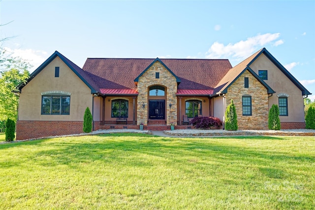 1250 Mountain Creek Rd, Rutherfordton, NC 28139 - view of front facade featuring stucco siding, stone siding, a front yard, and a standing seam roof