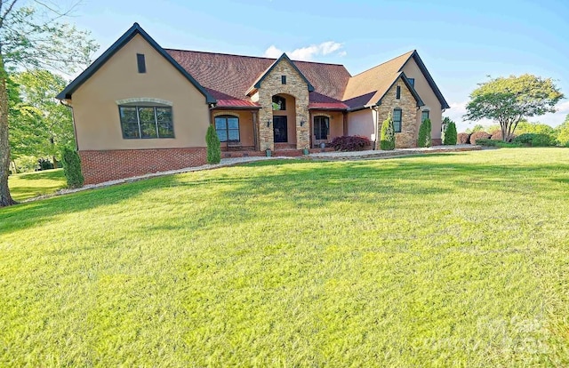 1250 Mountain Creek Rd, Rutherfordton, NC 28139 - view of front of property featuring stone siding, a front lawn, stucco siding, and brick siding