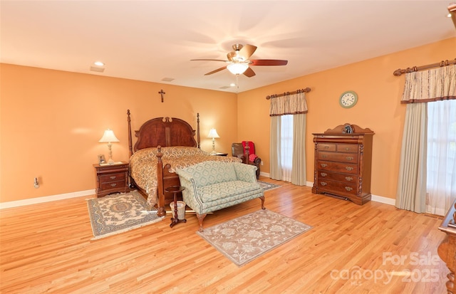 1250 Mountain Creek Rd, Rutherfordton, NC 28139 - bedroom with wood finished floors, baseboards, and a ceiling fan