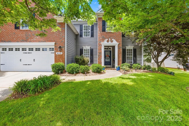 622 Lorain Ave NW, Concord, NC 28027 - view of front of home with concrete driveway, a front lawn, brick siding, and a garage