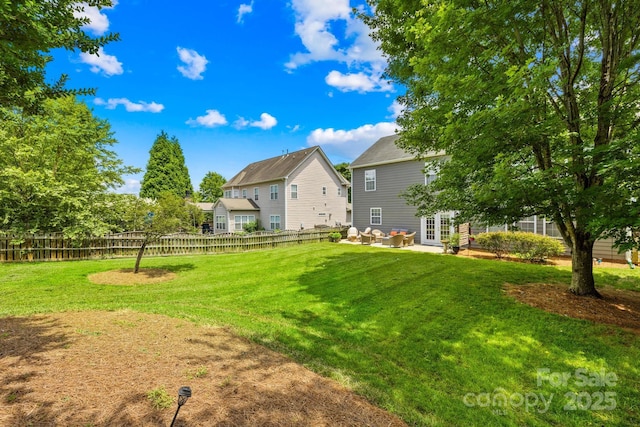 622 Lorain Ave NW, Concord, NC 28027 - view of yard featuring french doors and a patio